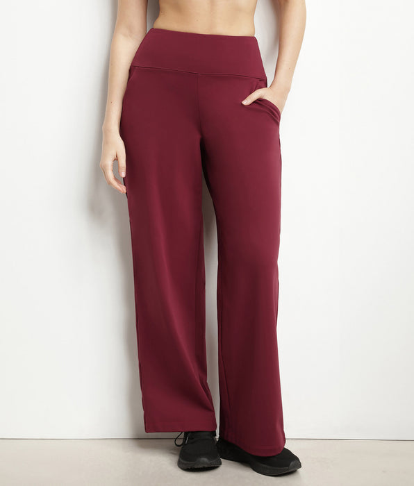 DIM Pantalon de sport femme large en jersey stretch Bordeaux Dim Move