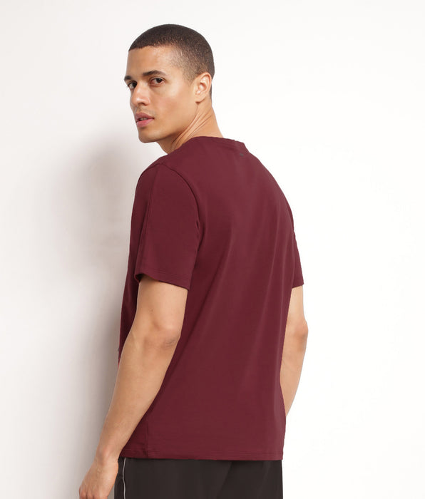 DIM Heren thermoregulerend sport T-shirt in DIM Move bordeaux jersey