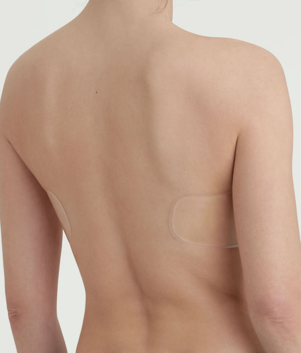 DIM Nude straploze zelfklevende bandeau bh